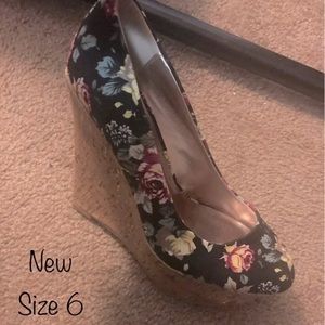 Black floral wedge heels